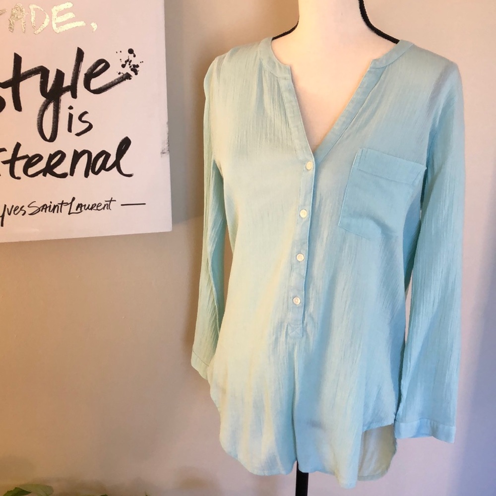 Light blue tunic. M.